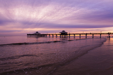 Fototapeta premium Evening light on the fishing pier in Fort Myers Beach.