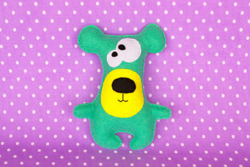 Fototapeta premium Handmade felt green bear toy 