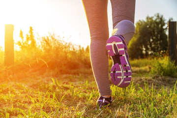 Woman running in a field