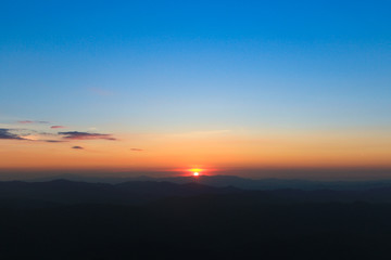 Fototapeta na wymiar Mountain valley during sunrise.