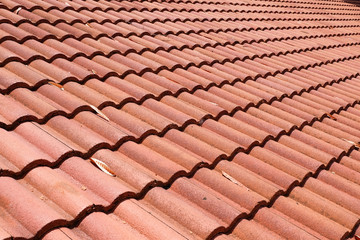 brown tile roof weathered on building residential