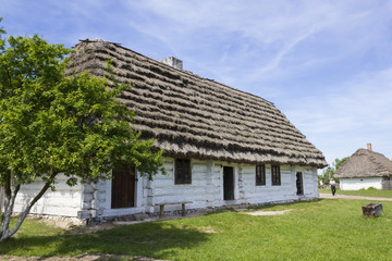 Fototapeta na wymiar Old cottage in the museum in Tokarnia near Kielce, Poland