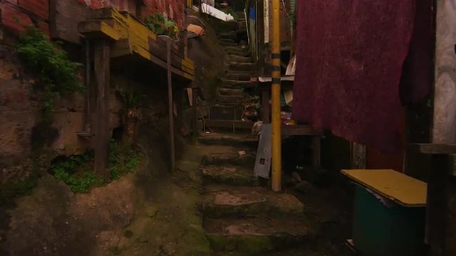 RIO DE JANEIRO, BRAZIL - JUNE 23: Tracking Shot up a flight of narrow stairs in Brazilian favela