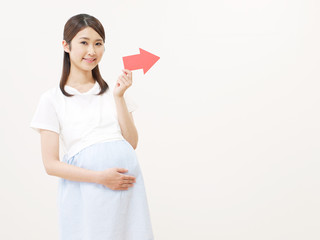 妊婦　矢印指し
