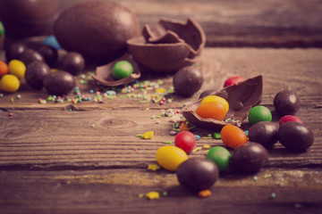 Chocolate Easter Eggs Over Wooden Background