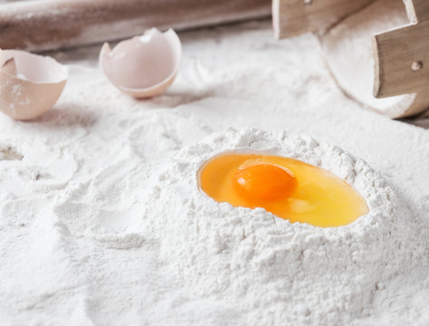 baking background, flour, egg and rolling pin