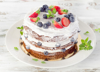 Cake with cream and berries
