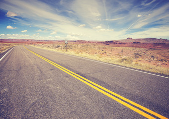Vintage stylized endless country highway, USA.