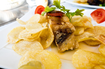 grilled salmon and lemon - french cuisine dish with tomato and s