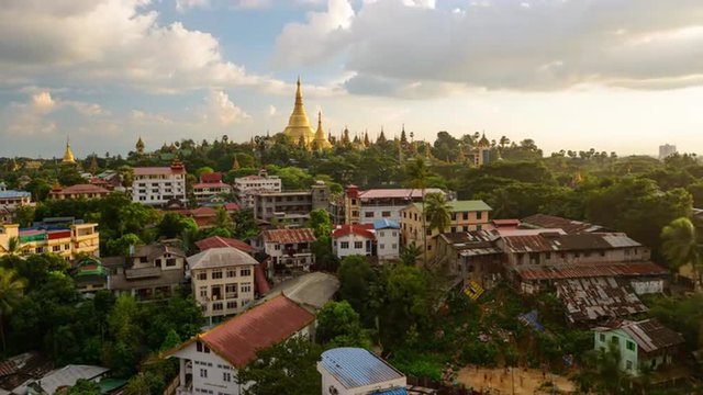 Yangon, Myanmar skyline time lapse over Singuttara Hill and Shwedagon Pagoda.