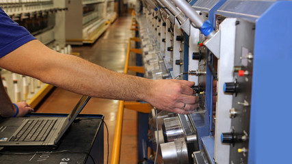 Checking Computerized Machine Status with Laptop Computer