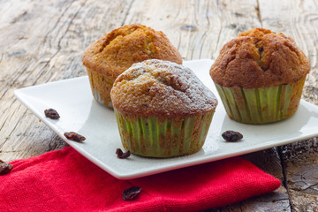 Muffins on a wooden table