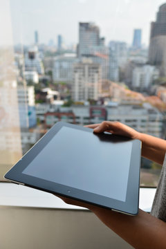 touching screen of a tablet computer
