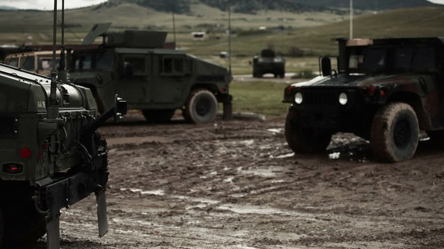 Humvee rolling out in mud