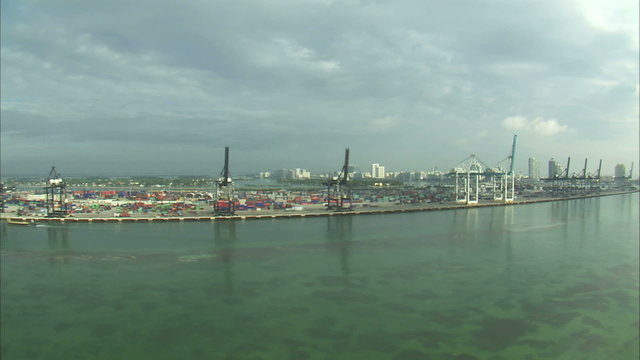 Aerial shot of cranes at a shipping yard in Miami.