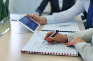 Fototapeta premium Real-estate agent showing house plans