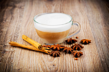 Cup of coffee on wooden background