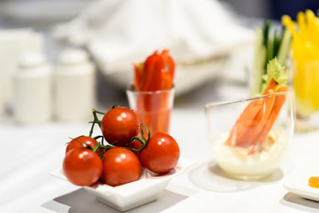 Cherry tomatoes and vegetables at a restaurant