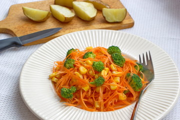carrot spaghetti, broccoli, corns and potatoes