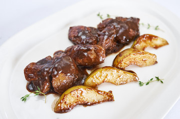 Chicken liver in balsamic sauce with pears.