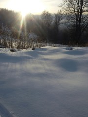 Sunrays in winter time on mountain