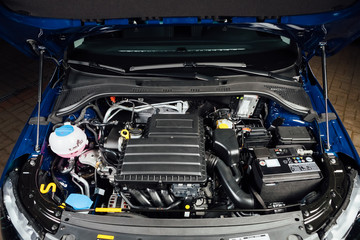 Fototapeta premium new car engine and parts under hood