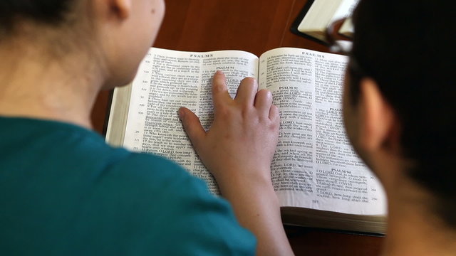 Couple Reading The Bible Together