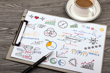 business and creativity concept on clipboard