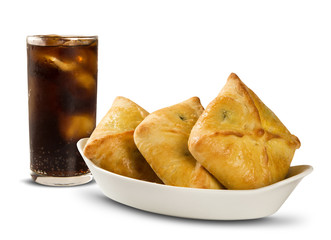 esfiha meat and soda on the white background .