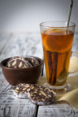 dessert of cookies, chocolate, coffee with tea