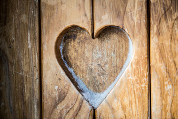 Heart shape on wooden wall