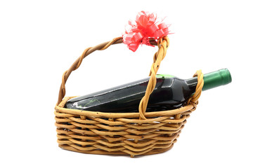 Fototapeta na wymiar wine bottle isolated in gift basket on white background