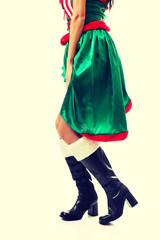 Slim woman legs wearing elf clothes