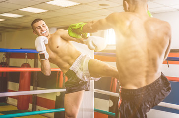 Fighters fighting on the ring
