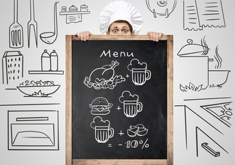 Blackboard for menu / Restaurant chef hiding behind a big chalkboard for a business lunch menu with sketchy notes.