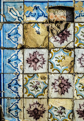 Old square decorative broken tiles