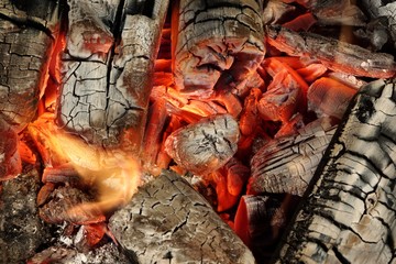 Charcoal Briquettes Glow In BBQ Grill Pit Background Texture