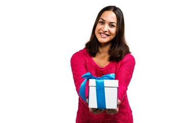 Portrait of smiling woman holding gift 