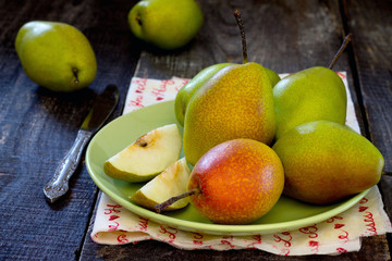 Fresh juicy pears on a table in a rustic style
