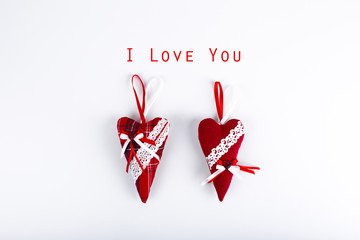 Two red valentine hearts isolated on white