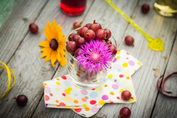 Obraz na płótnie Canvas Summer wooden dessert fruit gooseberry colorful drinks