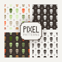 Set of vector seamless colorful and monochrome patterns of pixel skulls.