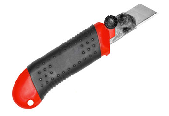 Single red-black office cutter for paper. Isolated on white background. Close-up. Studio...