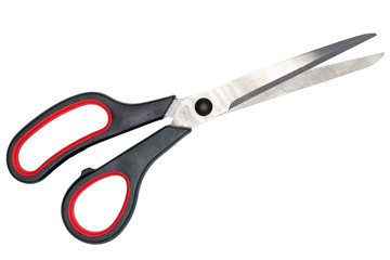 Single red-black steel scissors. Isolated on white background. Close-up. Studio photography.