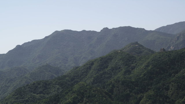 Panning shot of the mountains near the Great Wall of China at Badaling.