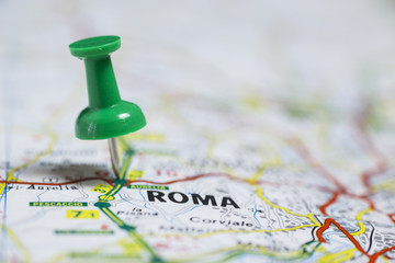 Pin indicates the destination on the road map - Roma (Italy)