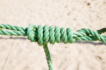 knot on a green rope