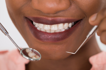 Woman Examining Her Teeth