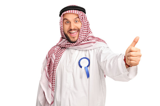Cheerful Arab with an award ribbon