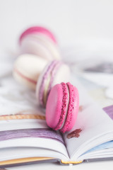 Colorful macaroons and recipe book
